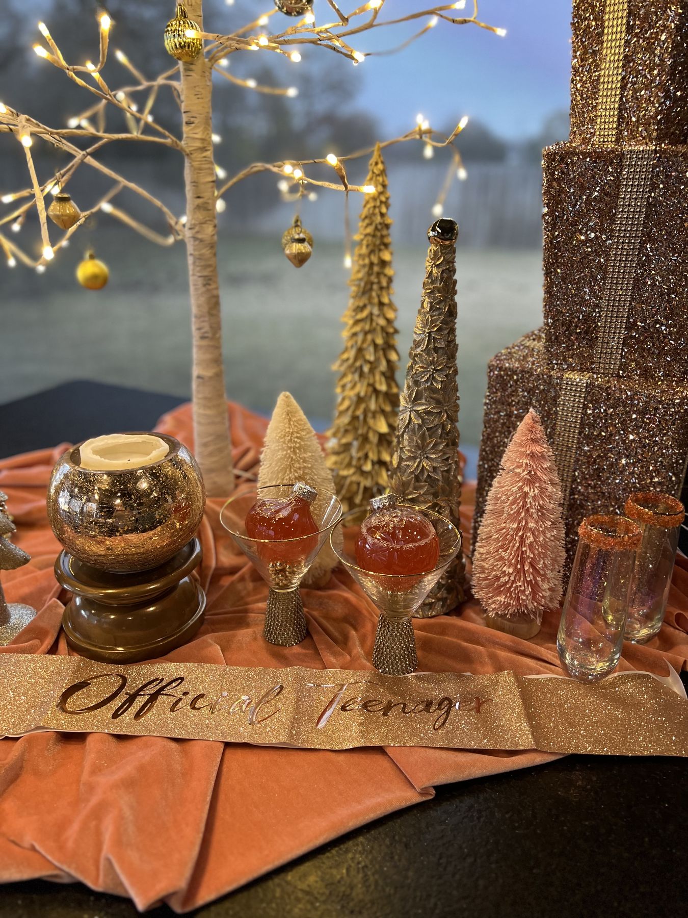 Amber glassware and candles on a holiday table